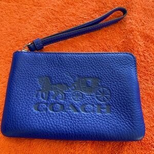 Coach Pebble blue leather  Corner zip wallet with detachable wrist strap.